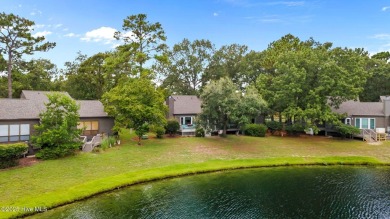 Enjoy captivating water views from nearly every room in this on Harbour Point Golf Club in North Carolina - for sale on GolfHomes.com, golf home, golf lot