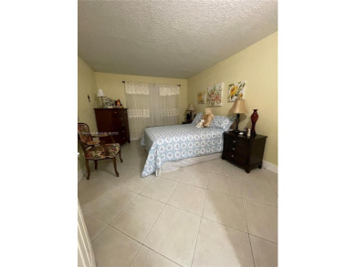 Beautiful and completely remodeled one bedroom in na 55+ on Sunrise Lakes Phase IV Golf Course in Florida - for sale on GolfHomes.com, golf home, golf lot