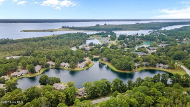 Enjoy captivating water views from nearly every room in this on Harbour Point Golf Club in North Carolina - for sale on GolfHomes.com, golf home, golf lot