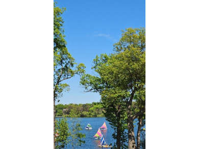PREMIUM LAKE LOCATION! LAKE VIEWS FROM BALCONY, LIVING ROOM on Lake Barrington Shores Golf Course in Illinois - for sale on GolfHomes.com, golf home, golf lot