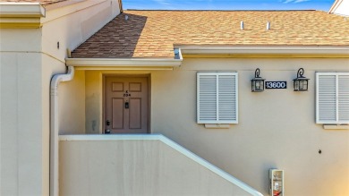 Welcome to this charming 2-bedroom, 2-bathroom condo in the on Feather Sound Country Club in Florida - for sale on GolfHomes.com, golf home, golf lot