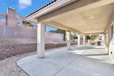 Welcome to this delightful 4-bedroom, 2-bathroom home located in on Spring Valley Lake Country Club in California - for sale on GolfHomes.com, golf home, golf lot