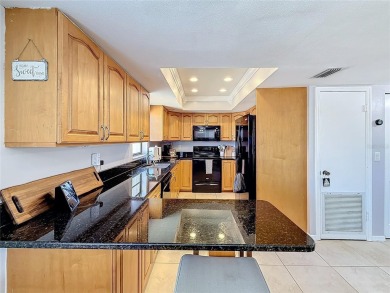 Welcome to this charming 2-bedroom, 2-bathroom condo in the on Feather Sound Country Club in Florida - for sale on GolfHomes.com, golf home, golf lot