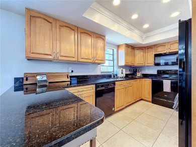 Welcome to this charming 2-bedroom, 2-bathroom condo in the on Feather Sound Country Club in Florida - for sale on GolfHomes.com, golf home, golf lot