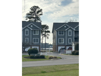 This stylishly renovated 2-bedroom home features a host of on Sound Golf Links at Albemarle Plantation in North Carolina - for sale on GolfHomes.com, golf home, golf lot