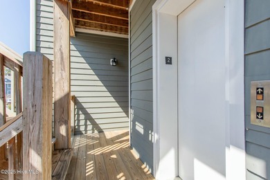 This stylishly renovated 2-bedroom home features a host of on Sound Golf Links at Albemarle Plantation in North Carolina - for sale on GolfHomes.com, golf home, golf lot