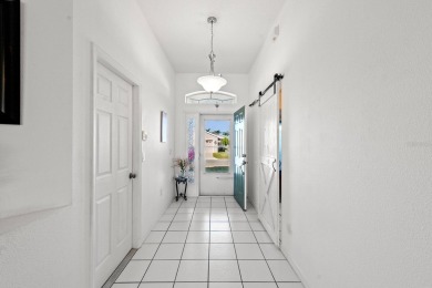 Welcome Home! NEW ROOF! This charming 2-bedroom, 2-bathroom home on Ridgewood Lakes Golf and Country Club in Florida - for sale on GolfHomes.com, golf home, golf lot