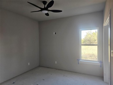 This home offers a comfortable and modern living space with a on Hideout Golf Club and Resort  in Texas - for sale on GolfHomes.com, golf home, golf lot