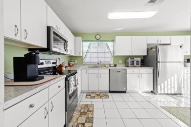 Welcome Home! NEW ROOF! This charming 2-bedroom, 2-bathroom home on Ridgewood Lakes Golf and Country Club in Florida - for sale on GolfHomes.com, golf home, golf lot