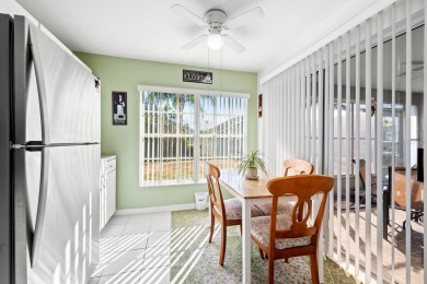Welcome Home! NEW ROOF! This charming 2-bedroom, 2-bathroom home on Ridgewood Lakes Golf and Country Club in Florida - for sale on GolfHomes.com, golf home, golf lot