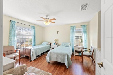 Welcome Home! NEW ROOF! This charming 2-bedroom, 2-bathroom home on Ridgewood Lakes Golf and Country Club in Florida - for sale on GolfHomes.com, golf home, golf lot