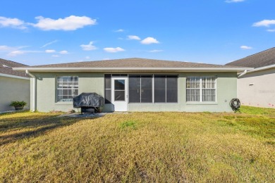 Welcome Home! NEW ROOF! This charming 2-bedroom, 2-bathroom home on Ridgewood Lakes Golf and Country Club in Florida - for sale on GolfHomes.com, golf home, golf lot