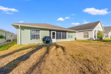 Welcome Home! NEW ROOF! This charming 2-bedroom, 2-bathroom home on Ridgewood Lakes Golf and Country Club in Florida - for sale on GolfHomes.com, golf home, golf lot