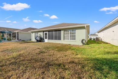 Welcome Home! NEW ROOF! This charming 2-bedroom, 2-bathroom home on Ridgewood Lakes Golf and Country Club in Florida - for sale on GolfHomes.com, golf home, golf lot