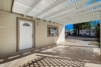 This fully renovated manufactured home is now available for sale on Date Palm Country Club in California - for sale on GolfHomes.com, golf home, golf lot
