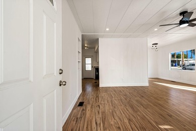 This fully renovated manufactured home is now available for sale on Date Palm Country Club in California - for sale on GolfHomes.com, golf home, golf lot