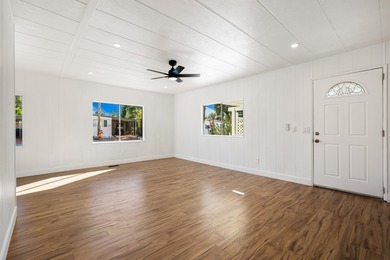 This fully renovated manufactured home is now available for sale on Date Palm Country Club in California - for sale on GolfHomes.com, golf home, golf lot