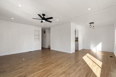 This fully renovated manufactured home is now available for sale on Date Palm Country Club in California - for sale on GolfHomes.com, golf home, golf lot