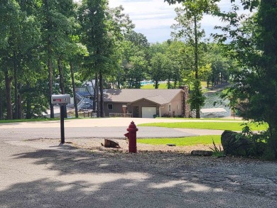 Lake Thunderbird, LAKE-VIEW LOT..e see the view from the point on Cherokee Village North Course in Arkansas - for sale on GolfHomes.com, golf home, golf lot