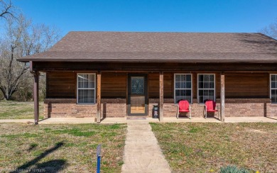 Looking for some extra space without leaving town? This property on Cherokee Creek Golf Club in Arkansas - for sale on GolfHomes.com, golf home, golf lot