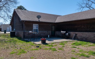 Looking for some extra space without leaving town? This property on Cherokee Creek Golf Club in Arkansas - for sale on GolfHomes.com, golf home, golf lot