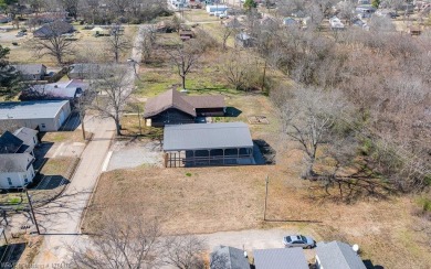 Looking for some extra space without leaving town? This property on Cherokee Creek Golf Club in Arkansas - for sale on GolfHomes.com, golf home, golf lot