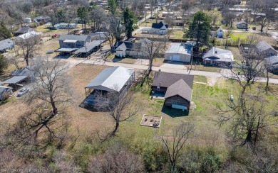 Looking for some extra space without leaving town? This property on Cherokee Creek Golf Club in Arkansas - for sale on GolfHomes.com, golf home, golf lot