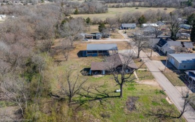 Looking for some extra space without leaving town? This property on Cherokee Creek Golf Club in Arkansas - for sale on GolfHomes.com, golf home, golf lot