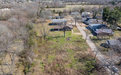 Looking for some extra space without leaving town? This property on Cherokee Creek Golf Club in Arkansas - for sale on GolfHomes.com, golf home, golf lot