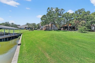 Welcome to this beautifully upgraded 3-bedroom, 3-bath home in on Lake Kiowa Golf Course in Texas - for sale on GolfHomes.com, golf home, golf lot