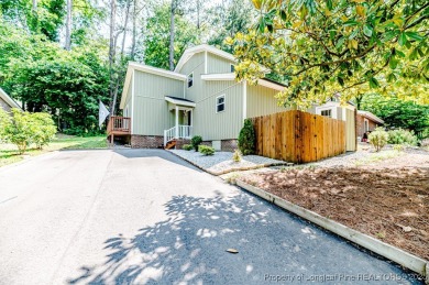 Seller has outgrown this beautifully updated 2-bedroom on Carolina Trace Country Club in North Carolina - for sale on GolfHomes.com, golf home, golf lot