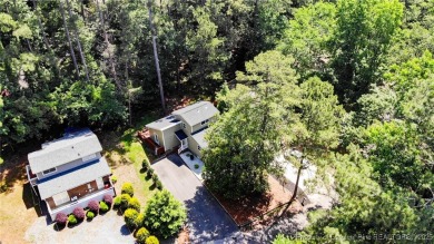 Seller has outgrown this beautifully updated 2-bedroom on Carolina Trace Country Club in North Carolina - for sale on GolfHomes.com, golf home, golf lot