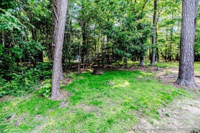 Seller has outgrown this beautifully updated 2-bedroom on Carolina Trace Country Club in North Carolina - for sale on GolfHomes.com, golf home, golf lot