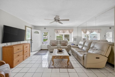 Welcome to this stunning 2-bedroom, 2-bathroom corner home on Leisureville Community Association in Florida - for sale on GolfHomes.com, golf home, golf lot
