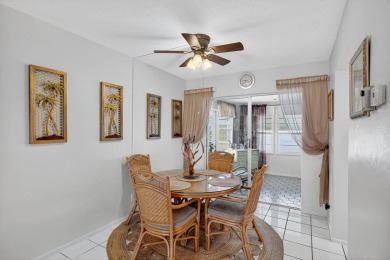 Welcome to this stunning 2-bedroom, 2-bathroom corner home on Leisureville Community Association in Florida - for sale on GolfHomes.com, golf home, golf lot
