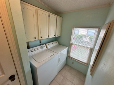 This 2-bedroom, 2 bathrooms Palm Harbor home is located on the on Del Tura Golf and Country Club in Florida - for sale on GolfHomes.com, golf home, golf lot