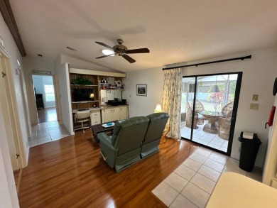 This 2-bedroom, 2 bathrooms Palm Harbor home is located on the on Del Tura Golf and Country Club in Florida - for sale on GolfHomes.com, golf home, golf lot