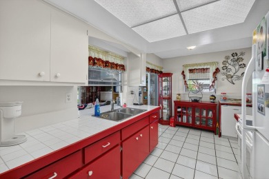 Welcome to this stunning 2-bedroom, 2-bathroom corner home on Leisureville Community Association in Florida - for sale on GolfHomes.com, golf home, golf lot