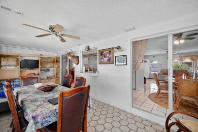 Welcome to this stunning 2-bedroom, 2-bathroom corner home on Leisureville Community Association in Florida - for sale on GolfHomes.com, golf home, golf lot