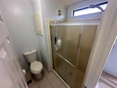 This 2-bedroom, 2 bathrooms Palm Harbor home is located on the on Del Tura Golf and Country Club in Florida - for sale on GolfHomes.com, golf home, golf lot