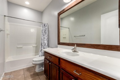 This 4-bedroom, 2-bathroom pool home in Johnson Ranch offers on The Golf Club At Johnson Ranch in Arizona - for sale on GolfHomes.com, golf home, golf lot