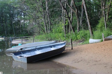 WATERFRONT Property with amenities galore! Build your house or on Lakes of the North Deer Run Golf Course in Michigan - for sale on GolfHomes.com, golf home, golf lot