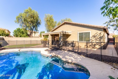 This 4-bedroom, 2-bathroom pool home in Johnson Ranch offers on The Golf Club At Johnson Ranch in Arizona - for sale on GolfHomes.com, golf home, golf lot