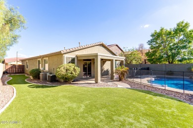 This 4-bedroom, 2-bathroom pool home in Johnson Ranch offers on The Golf Club At Johnson Ranch in Arizona - for sale on GolfHomes.com, golf home, golf lot
