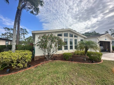 This 2-bedroom, 2 bathrooms Palm Harbor home is located on the on Del Tura Golf and Country Club in Florida - for sale on GolfHomes.com, golf home, golf lot