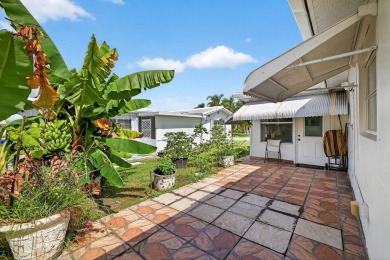 Welcome to this stunning 2-bedroom, 2-bathroom corner home on Leisureville Community Association in Florida - for sale on GolfHomes.com, golf home, golf lot