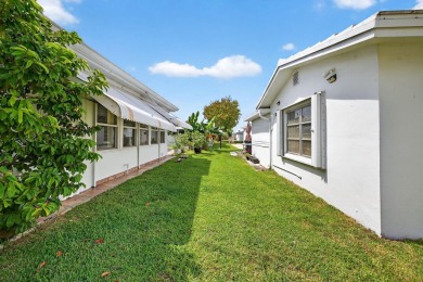 Welcome to this stunning 2-bedroom, 2-bathroom corner home on Leisureville Community Association in Florida - for sale on GolfHomes.com, golf home, golf lot