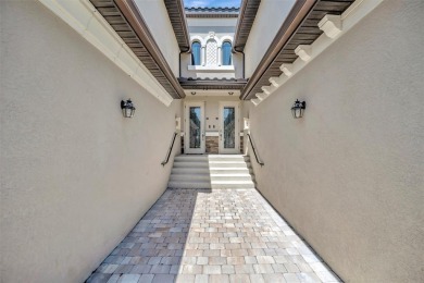This stunning three-bedroom, two-bath second floor coach home on Lakewood National Golf Club in Florida - for sale on GolfHomes.com, golf home, golf lot