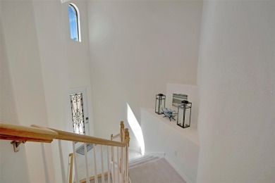 This stunning three-bedroom, two-bath second floor coach home on Lakewood National Golf Club in Florida - for sale on GolfHomes.com, golf home, golf lot