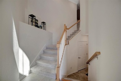 This stunning three-bedroom, two-bath second floor coach home on Lakewood National Golf Club in Florida - for sale on GolfHomes.com, golf home, golf lot
